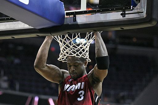 Dwyane Wade hanging on the rim
Keith Allison, CC BY-SA 2.0, via Wikimedia Commons