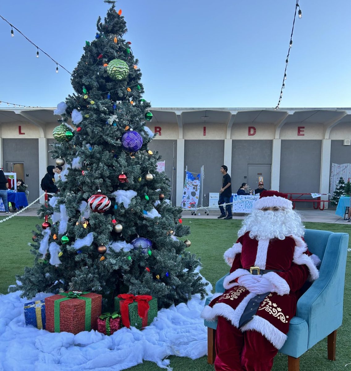 Frosty Fest Santa by the Christmas Tree